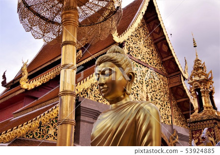 Buddha image and image with calm expression under cloudy sky (Chiang Mai) 53924885