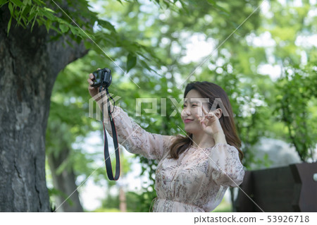 Facial expression of Korean female, park, Namsan Facial expression of Korean female, park, Namsan 53926718