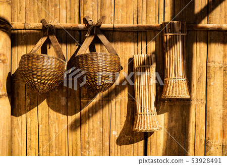 bamboo basket hanging on bamboo wall bamboo basket hanging on bamboo wall 53928491