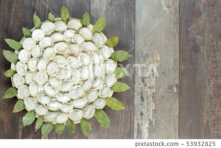 Meat dumplings - russian pelmeni on wooden background. Top view Meat dumplings - russian pelmeni on wooden background. Top view 53932825