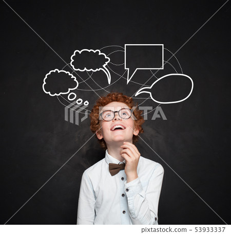 Smart kid boy with empty speech clouds bubbles Smart kid boy with empty speech clouds bubbles 53933337