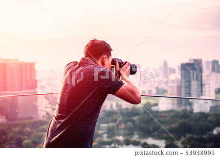 photographer take photos 53938991