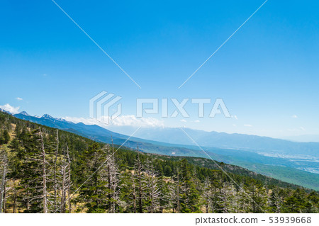 Shibikiyama foot (front), Yatsugatake mountain range (left center), Southern Alps (most deep): Taken from Skyeye Chino City 53939668