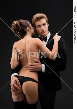 Passionate young couple of lovers in passion Passionate young couple of lovers in passion 53939875