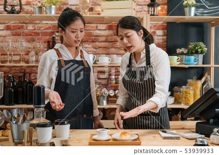 angry owner of restaurant scolding new employee angry owner of restaurant scolding new employee 53939933