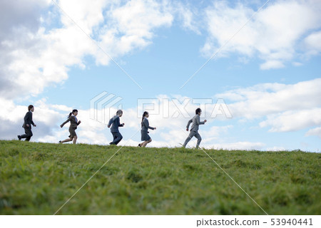 Freshers running in the meadow Freshers running in the meadow 53940441