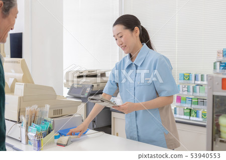 Convenience Store, newspaper, salesperson 53940553