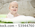 Funny cute bay boy taking a bath outdoor. Funny toddler in a soapy foam. 53944760