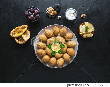 Traditional Arabic kibbeh with lamb and pine nuts. 53947295