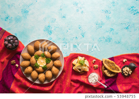 Traditional Arabic kibbeh with lamb and pine nuts. 53948755
