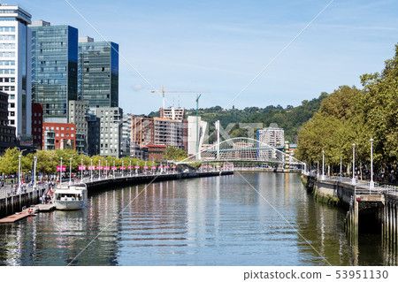 Zubizuri bridge through Nervion River in Bilbao, Spain Zubizuri bridge through Nervion River in Bilbao, Spain 53951130