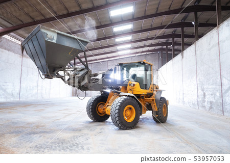 Wheel loader excavator. Construction machine in the hangar. 53957053