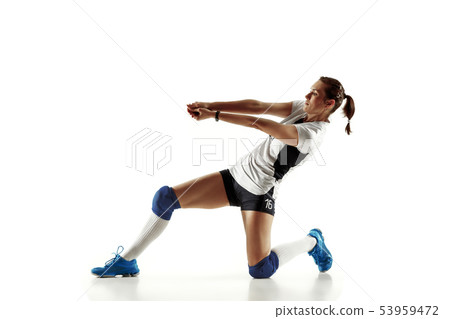 Young female volleyball player isolated on white studio background Young female volleyball player isolated on white studio background 53959472