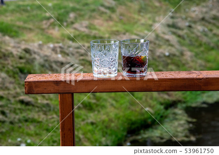Two glasses of  whiskey in outdoor 53961750