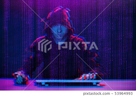 Hacker working with computer in dark room with digital interface around. Image with glitch effect. 53964993