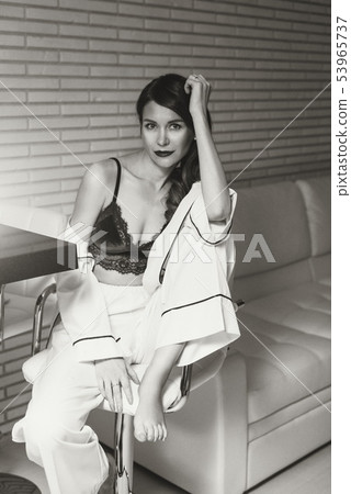 Pretty girl in lingerie at design interior Pretty girl in lingerie at design interior 53965737