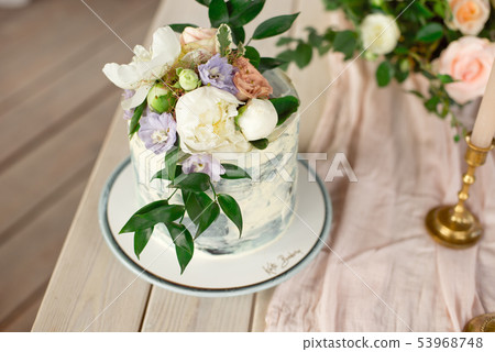 Wedding decoration table in the garden, floral arrangement, In the style vintage on outdoor. Wedding Wedding decoration table in the garden, floral arrangement, In the style vintage on outdoor. Wedding 53968748