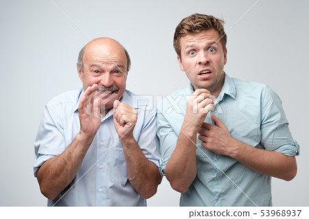 Amazed two mature men is shocked a little with news. Amazed two mature men is shocked a little with news. 53968937