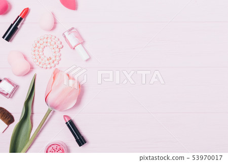 Women's makeup products and accessories on pink Women's makeup products and accessories on pink 53970017
