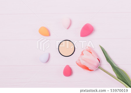 Creative flat layout of cosmetic beige foundation Creative flat layout of cosmetic beige foundation 53970019