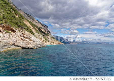 Sailboat off the coast of Sardinia - Italy 53971079