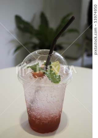Refreshment drink with iced mix berry soda 53974950