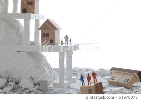 Houses and people left behind on steep cliff slopes due to disaster Houses and people left behind on steep cliff slopes due to disaster 53976078