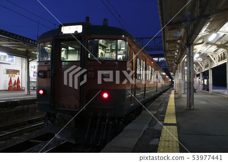 Shinano Railway Series 115 (Shonan color) parked at Myoko Kogen Station in winter Shinano Railway Series 115 (Shonan color) parked at Myoko Kogen Station in winter 53977441