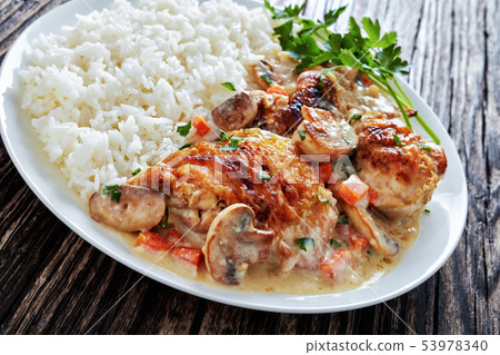 chicken fricassee served with rice, top view chicken fricassee served with rice, top view 53978340