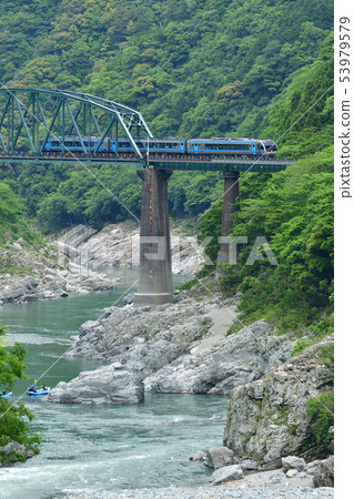 Limited express train crossing the second Yoshinogawa bridge Limited express train crossing the second Yoshinogawa bridge 53979579