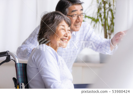 Senior wheelchair smile hope 53980424