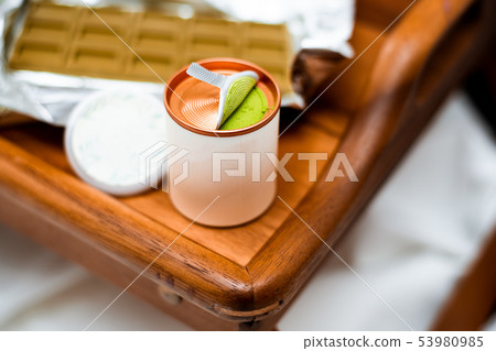 Blurred defocus image with a cylindrical open box 53980985