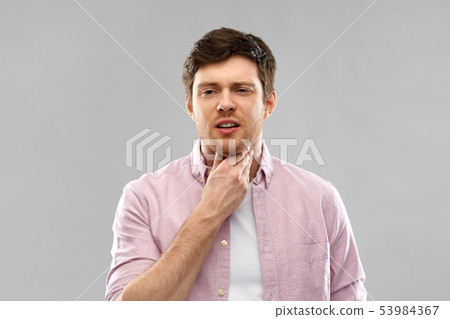 man suffering from sore throat 53984367