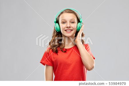 happy teenage girl with headphones 53984970
