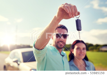 happy man and woman with car key outdoors happy man and woman with car key outdoors 53985150