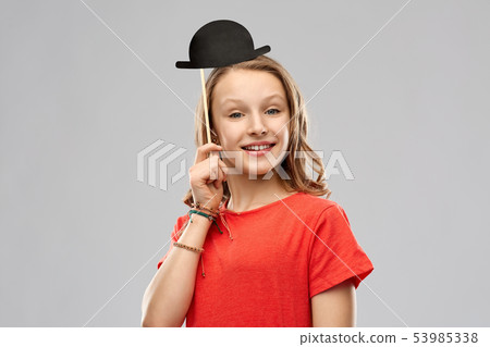 smiling teenage girl with bowler hat party prop smiling teenage girl with bowler hat party prop 53985338