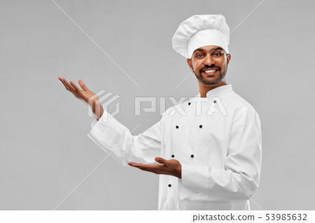 happy male indian chef in toque happy male indian chef in toque 53985632