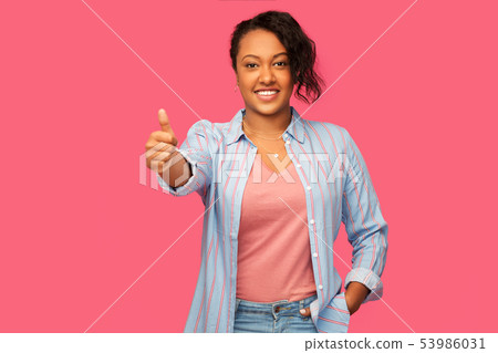 happy african american woman showing thumbs up 53986031
