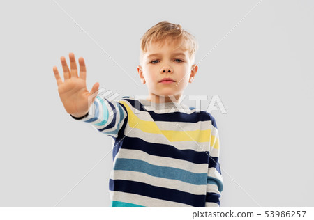 little boy in striped pullover little boy in striped pullover 53986257