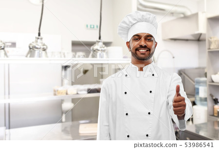 indian chef showing thumbs up at kitchen indian chef showing thumbs up at kitchen 53986541