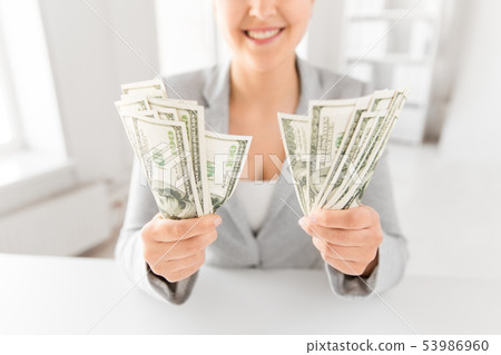 close up of woman hands holding us dollar money 53986960
