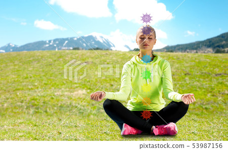 woman doing yoga outdoors 53987156