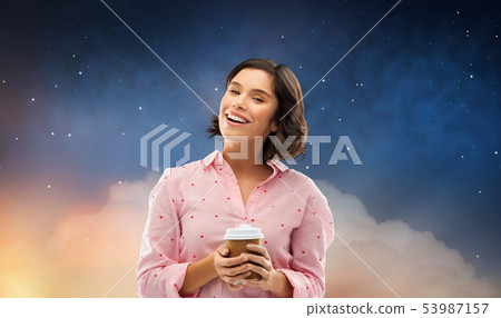 happy young woman in pajama with cup of coffee happy young woman in pajama with cup of coffee 53987157