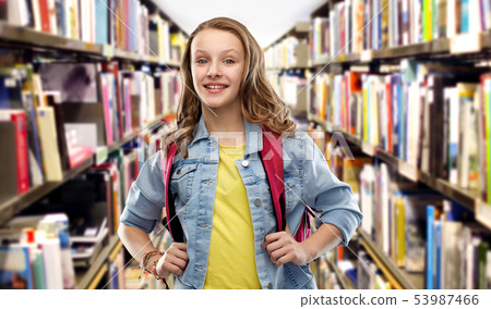 smiling student girl with school bag at library smiling student girl with school bag at library 53987466