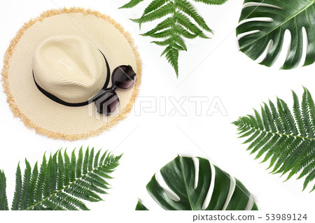Straw beach sun hat with sunglasses,border of tropical monstera and fern on white. Straw beach sun hat with sunglasses,border of tropical monstera and fern on white. 53989124