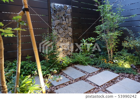 A small garden with a gabion Light up when twilight 53990242