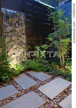 A small garden with a gabion Light up when twilight 53990248