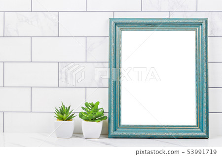 Blank blue vintage photo frame with cactus. Blank blue vintage photo frame with cactus. 53991719