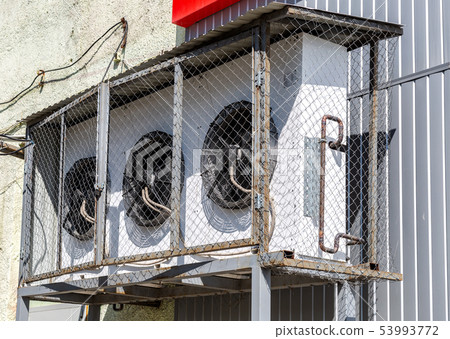 Industrial air conditioners hang on the wall 53993772
