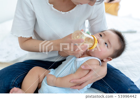 Breastfeeding Mom and 6 month baby Breastfeeding Mom and 6 month baby 53996442